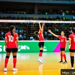 Home 22 배구 관련 재미있는 사실 - A dynamic volleyball court scene showing a diverse team of players mid-action, communicating intense...